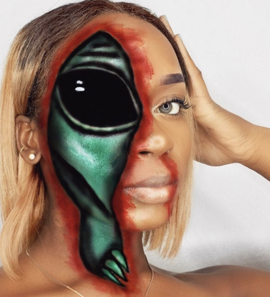 Portrait of woman wearing black red and green makeup