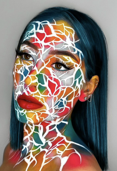 Portrait of a woman wearing multicolored makeup on face